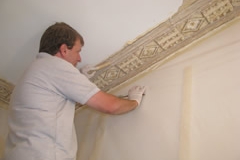 Cornice Being Cleaned