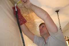 Cornice Being Cleaned